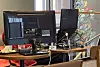 A customer sets up an external desktop monitor and a multi-port power strip in a Starbucks branch in this undated photo uploaded onto an online community [SCREEN CAPTURE]