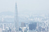Seoul appears hazy from Namhansanseong, a historic mountain fortress, in Gwangju, Gyeonggi, on April 21, as the level of yellow dust leads to fine dust advisories being issued across much of the country. [YONHAP]