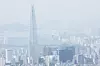 Seoul appears hazy from Namhansanseong, a historic mountain fortress, in Gwangju, Gyeonggi, on April 21, as the level of yellow dust leads to fine dust advisories being issued across much of the country. [YONHAP]