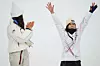 American silver medalist Chloe Kim, left, claps as Korean gold medalist Choi Ga-on celebrates winning the women's snowboarding halfpipe finals at the 2026 Milan-Cortina Winter Olympics, in Livigno, Italy, on Feb. 12. [AP/YONHAP]