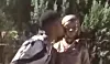 A still from a video uploaded by Johnny Somali on Oct. 9, 2024, shows the streamer kissing the Statue of Peace in Itaewon in Yongsan District, central Seoul. The public outrage comes as the statue represents young girls and women who were forced into wartime sexual slavery by the Japanese military in the 20th century. [SCREEN CAPTURE]