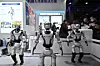 Robots from Leju Robot are displayed as people visit the 2026 Beijing Science Fiction Carnival in Beijing on March 28. [AFP/YONHAP]