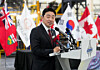 Presidential chief of staff Kang Hoon-sik, left, speaks to employees as he visits Martinrea International, in Woodbridge, Ontario, Canada, on Monday, June 1, 2026. [AP/YONHAP]