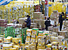 Customs workers examine goods shipped and purchased through direct overseas orders at the Incheon International Airport Headquarters Customs Express Logistics Center on Nov. 20, 2024. [YONHAP]