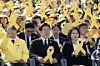 President Lee Jae Myung, center, and first lady Kim Hea Kyung, right attend a memorial event for the 2014 Sewol ferry sinking in Ansan, Gyeonggi, on April 16. [JOINT PRESS CORPS]