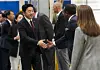 Kang Hoon-sik, left, chief of staff to the president, shakes hands on the manufacturing floor as he visits Martinrea International, in Woodbridge, Ontario, Canada, on Monday, June 1, 2026. [AP/YONHAP]