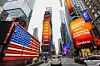Times Square screens display announcements from AI chip maker Cerebras Systems during the company’s IPO in New York on May 14. [REUTERS/YONHAP]