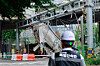 An official enters the collapsed site of the Seosomun Overpass in western Seoul on May 28. [NEWS1]