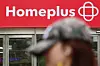 A person passes by a Homeplus branch in Songpa District, southern Seoul, on June 4. [NEWS1]