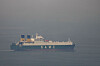 A cargo ship sails in the Arabian Gulf towards Strait of Hormuz in United Arab Emirates on March 15. [AP/YONHAP]