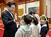 President Lee Jae Myung, left, greets children as they tour the Blue House in central Seoul on May 5, Children's Day. [JOINT PRESS CORPS]
