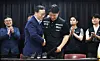 Samsung Electronics Device Solutions Division People Team head Yeo Myung-gu, left, and Choi Seung-ho, head of the Samsung Electronics chapter of the Samsung Group United Union, join hands after concluding wage negotiations for Samsung Electronics at the Gyeonggi Regional Employment and Labor Office in Jangan District, Suwon, Gyeonggi, on May 20. [JOINT PRESS CORPS]