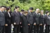 President Lee Jae Myung, second from left, observes a moment of silence at a memorial ceremony marking the 17th anniversary of the death of former President Roh Moo-hyun in the rural village of Bongha, Gimhae, South Gyeongsang, on May 23. [JOINT PRESS CORPS]