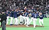 Korea’s national baseball team celebrates after defeating Australia to secure a place in the quarterfinals during the final Group C game of the 2026 World Baseball Classic at Tokyo Dome in Tokyo on March 9. [YONHAP]