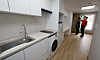 Visitors look inside a public youth housing unit in Dongjak District, eastern Seoul, in April 2024. [JOINT PRESS CORPS]