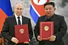 Russian President Vladimir Putin, left, and North Korea's leader Kim Jong-un pose for a photo during a signing ceremony of their new partnership in Pyongyang, North Korea, on June 19, 2024. [AP/YONHAP]