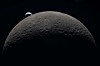 The image, captured by the Artemis II crew, shows the Earth setting behind the Moon during a lunar flyby on April 6. [AP/NASA/YONHAP]