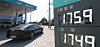 Fuel prices are displayed on a board outside a gas station in Seoul on March 12. [NEWS1]