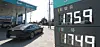 Fuel prices are displayed on a board outside a gas station in Seoul on March 12. [NEWS1]