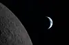 The image, captured by the Artemis II crew, shows the Earth next to the Moon before Earthset during a lunar flyby on April 6. [AP/NASA/YONHAP]