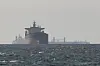 Tankers sail near the Strait of Hormuz as seen from Ras al-Khaimah, the United Arab Emirates, on March 11 amid the U.S.-Israeli conflict with Iran on March 11. [REUTERS/YONHAP]