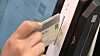 A person using a credit card [YONHAP]