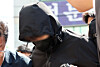 The suspect of a fatal stabbing attends his questioning session before detention at the Gwangju District Court on May 7. [YONHAP]