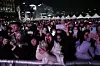 Fans cheer and hold up their phones to capture K-pop band BTS's comeback concert held at Gwanghwamun Square in central Seoul on March 21. [AP/YONHAP]