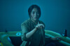 Soo-in, played by Kim Hye-yoon, heads to the Salmokji reservoir with her team for a road-view reshoot and encounters mysterious events there in the horror film “Salmokji: Whispering Water.” [SHOWBOX]