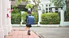 A student with backpack walks along a street [SHUTTERSTOCK/ JOONGANG ILBO]
