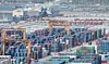Export-bound shipping containers are seen in Pyeongtaek port in Gyeonggi on May 8. [NEWS1]