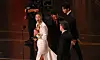 EJAE, front, accepts the Original Song award for ″KPop Demon Hunters″ (2025) onstage during the 98th Oscars at the Dolby Theatre in Hollywood, California, on March 15. [AFP/YONHAP]