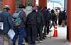 Elderly residents line up to receive free boxed meals provided by a civic group at Tapgol Park in Jongno District, Seoul, in early January 2025. In 2026, single-person elderly households with a monthly income of 2.47 million won or less are eligible for the basic pension. [NEWS1]