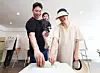 A family casts their ballots at a polling station set up in the showroom of a Kia Daegongwon dealership in Gwangjin District, Seoul, on the morning of June 3, the day of the 9th nationwide local elections. [NEWS1]