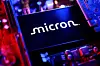 A Micron logo and a computer motherboard appear in this illustration created on August 25, 2025. [REUTERS/YONHAP]
