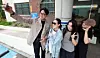 Voters pose for commemorative photos after voting at a polling station set up at Eonju Middle School in Gangnam District, Seoul, on June 3, the day of the 9th nationwide local elections and National Assembly by-elections. [NEWS1]