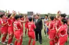 North Korean leader Kim Jong-un meets and encourages players and coaches after an exhibition match between North Korea's national team, winner of the 2026 AFC U-17 Women's Asian Cup, and Naegohyang Women's FC, winner of the 2025-26 AFC Women's Champions League, at an event marking the 80th anniversary of the founding of the Workers' Party's Central Cadres Training School on June 1, as reported by North's Rodong Sinmun the following day. [NEWS1]