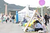 Visitors read books at Gwanghwamun Square during the Seoul Outdoor Library event on April 23. [YONHAP]