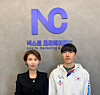 Park Eun-nim, the CEO of Next Creative, left, poses with speed skater Koo Kyung-min [NEXT CREATIVE]
