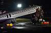 An Air Canada Jet sits on the runway at LaGuardia Airport in New York, March 23, after colliding with a Port Authority aircraft rescue and firefighting vehicle after landing. [AP/YONHAP]