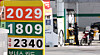 Fuel prices are seen on a display in front of a gas station in Seoul on March 31. [NEWS1]