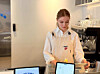 Lea Maxima Septinus from Germany makes coffee at a cafe. [LEA MAXIMA SEPTINUS]