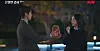 A scene from ″Filing for Love,″ in which a younger male romantic interest hands a teddy bear to the lead female protagonist [SCREEN CAPTURE]