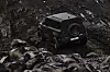 The Land Rover Defender OCTA Black drive off-road at the Destination Defender 2026 event. [JAGUAR LAND ROVER KOREA]