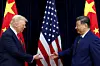 U.S. President Donald Trump, left, shakes hands with Chinese President Xi Jinping as they hold a bilateral meeting at Gimhae International Airport, on the sidelines of the APEC summit, in Busan on Oct. 30, 2025. [REUTERS/YONHAP]
