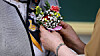A student gives a teacher a carnation at a high school in Mapo District, western Seoul, for Teacher's Day on May 15, 2023. [YONHAP]