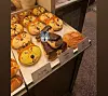 Neukgu-themed buns are on sale at a bakery in Daejeon. Neukgu is a wolf that briefly escaped from a zoo. [SCREEN CAPTURE]