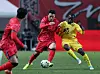 Korea's Cho Yu-min, center, tries to break through during the Hana Bank Invitational friendly against Ghana at Seoul World Cup Stadium in Mapo District, western Seoul, on Nov. 18, 2025. [NEWS1]