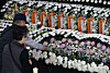 People pay their respects at a joint memorial altar for the victims of the fire at Anjun Industrial in Daejeon Metropolitan City Hall in Daejeon on March 22. [YONHAP]