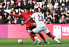 Korea's Son Heung-min, left, vies for the ball during a friendly against Ivory Coast at Stadium MK in Britain on March 28. [REUTERS/YONHAP]